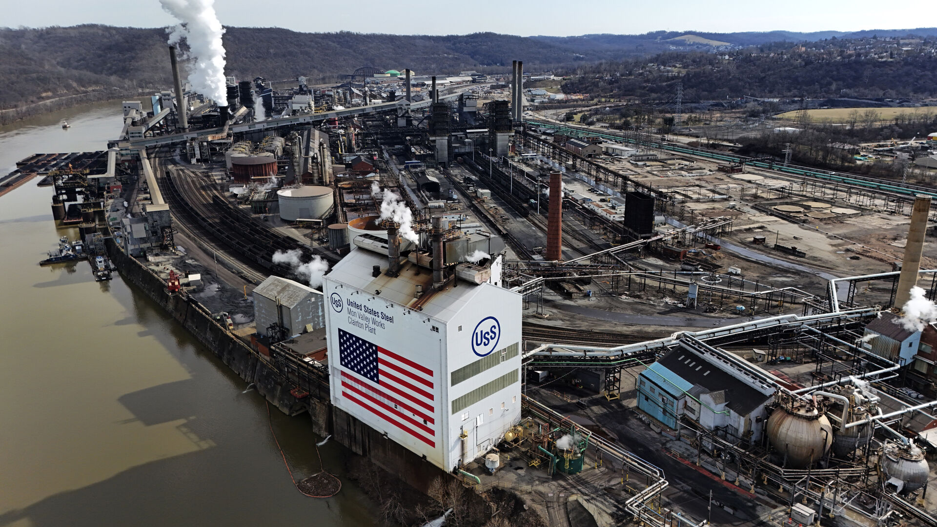 <p>FILE - The United States Steel Mon Valley Works Clairton Plant in Clairton, Pa., is shown on Feb. 26, 2024. President Biden and Donald Trump agree on essentially nothing, from taxes and climate change to immigration and regulation. Yet on trade policy, the two presumptive presidential nominees have embraced surprisingly similar approaches. (AP Photo/Gene J. Puskar, File)</p>   PHOTO CREDIT: Gene J. Puskar