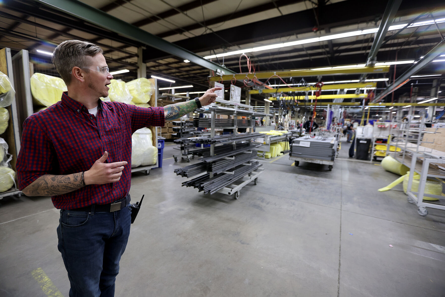 Jesse Blad, operations director at Modernfold, talks about the assembly lines at the company located in Dyersville, Iowa.    PHOTO CREDIT: Dave Kettering Telegraph Herald