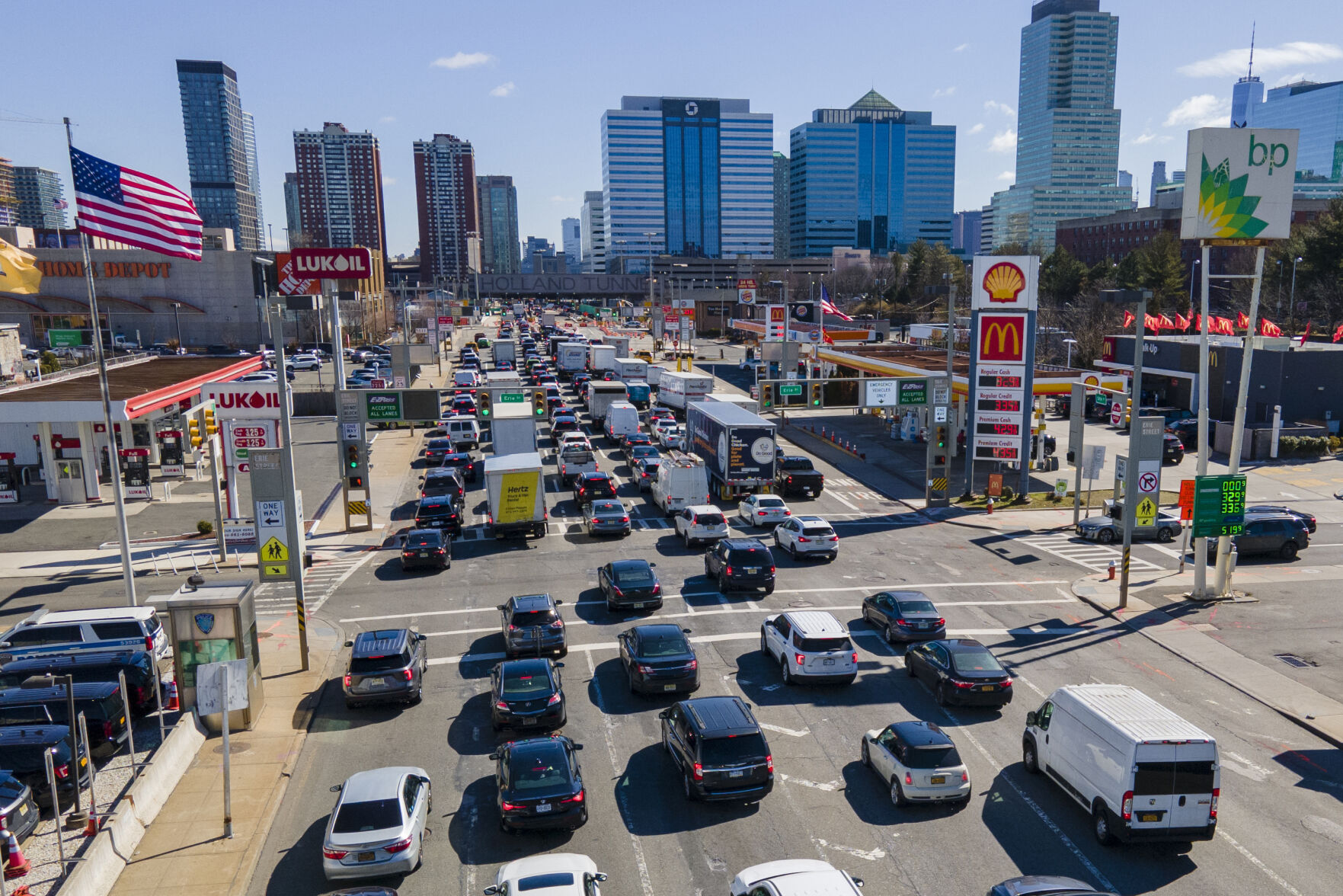 <p>FILE - Commuters wait to drive through the Holland Tunnel into New York City during morning rush hour traffic in Jersey City, N.J.,, Wednesday, March 8, 2023. A study published Wednesday, May 22, 2024, says U.S. vehicles hit a record average age of 12.6 years in 2024 as people continue to hang on to their rides largely because new ones cost so much. (AP Photo/Ted Shaffrey, File)</p>   PHOTO CREDIT: Ted Shaffrey 