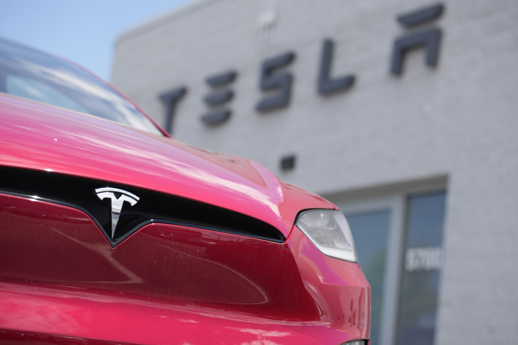 <p>FILE - A Model X sports-utility vehicle sits outside a Tesla store in Littleton, Colo., June 18, 2023. Electric vehicle maker Tesla has begun construction of a factory in Shanghai to make its Megapack energy storage batteries, Chinese state media reported Thursday, May 23, 2024. (AP Photo/David Zalubowski, File)</p>   PHOTO CREDIT: David Zalubowski 