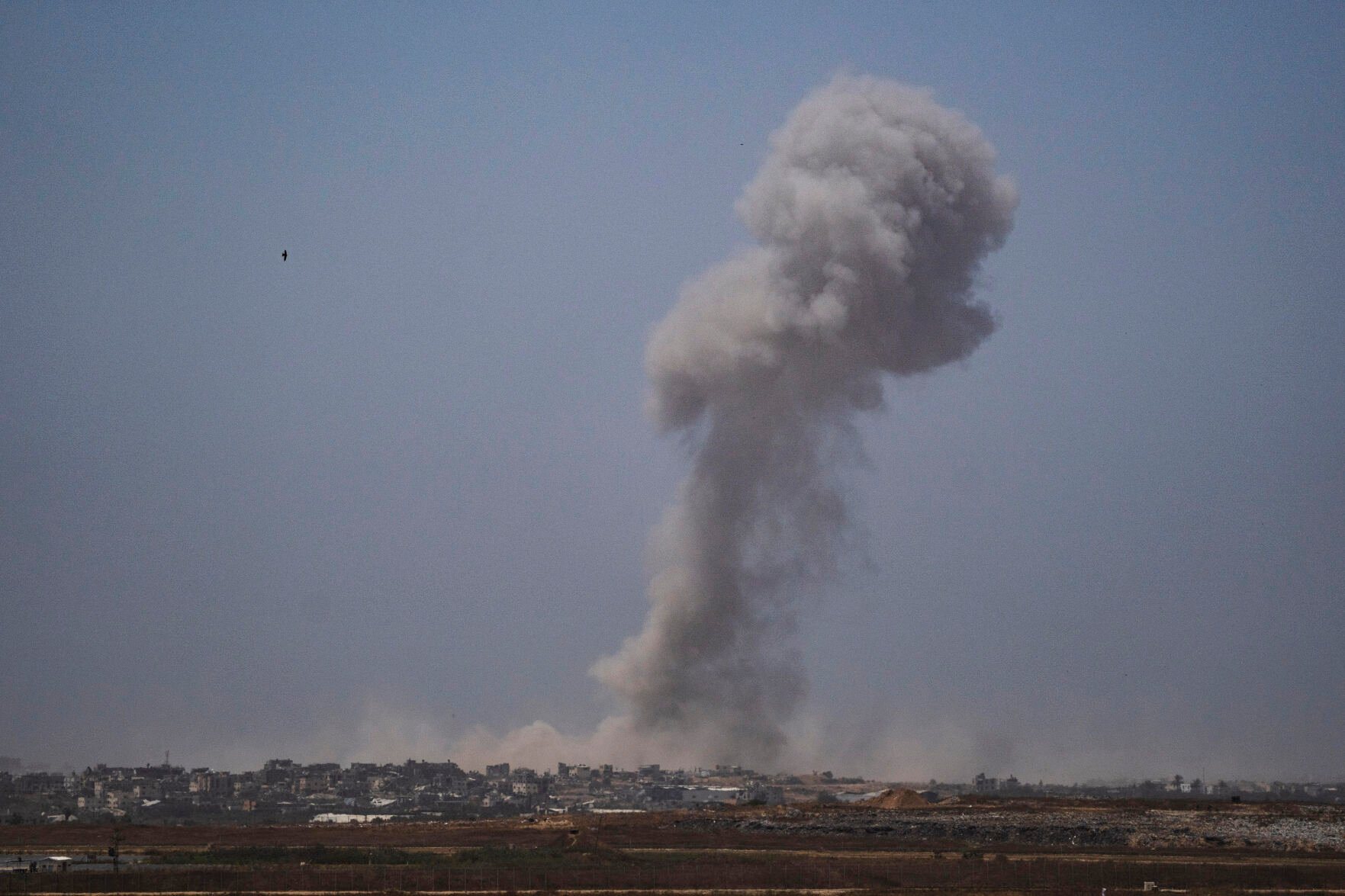 <p>FILE - Smoke billows after an explosion in the Gaza Strip, as seen from southern Israel on May 21, 2024. (AP Photo/Leo Correa, File)</p>   PHOTO CREDIT: Leo Correa 