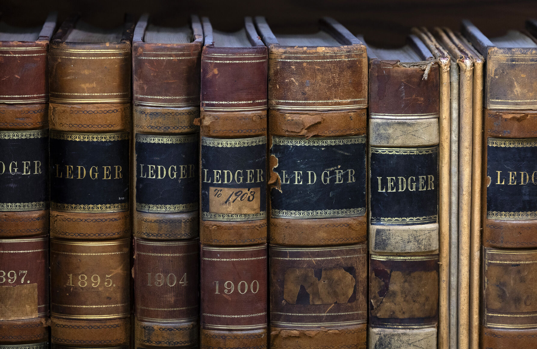 Old ledgers at Ungs Shopping Center in Luxemburg, Iowa.    PHOTO CREDIT: Stephen Gassman
Telegraph Herald