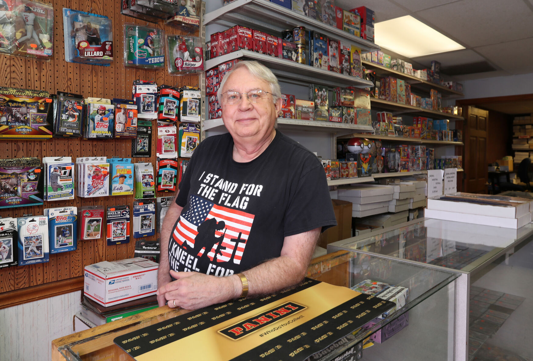 Tri-State Baseball Cards owner Dave Orr displays some of the many cards and collectibles available in his store in 2021.    PHOTO CREDIT: Stephen Gassman