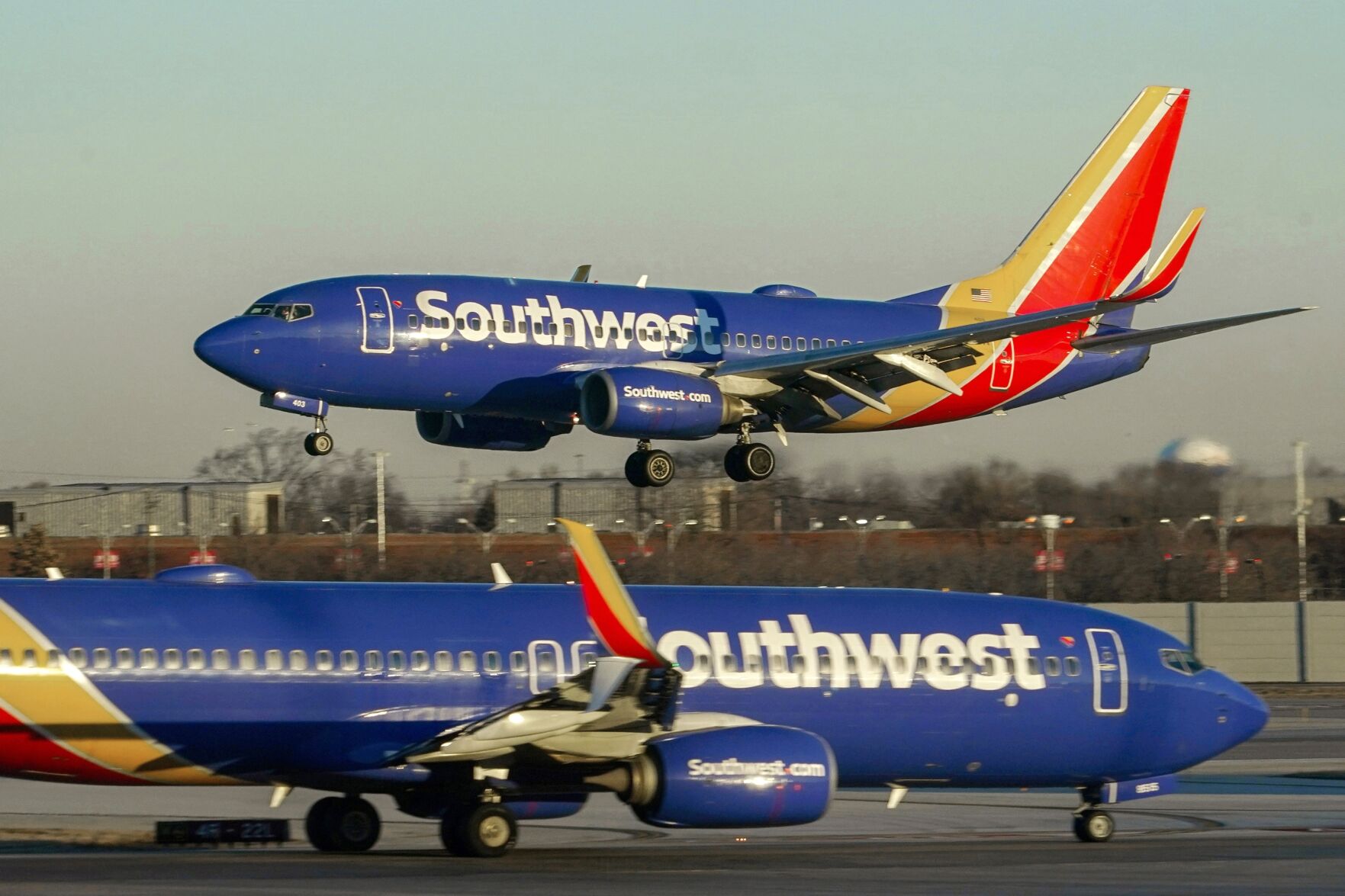 <p>FILE - Southwest Airlines plane prepares to land at Midway International Airport, Feb. 12, 2023, in Chicago. Southwest Airlines is back in court over firing a flight attendant with anti-abortion views. (AP Photo/Kiichiro Sato, File)</p>   PHOTO CREDIT: Kiichiro Sato