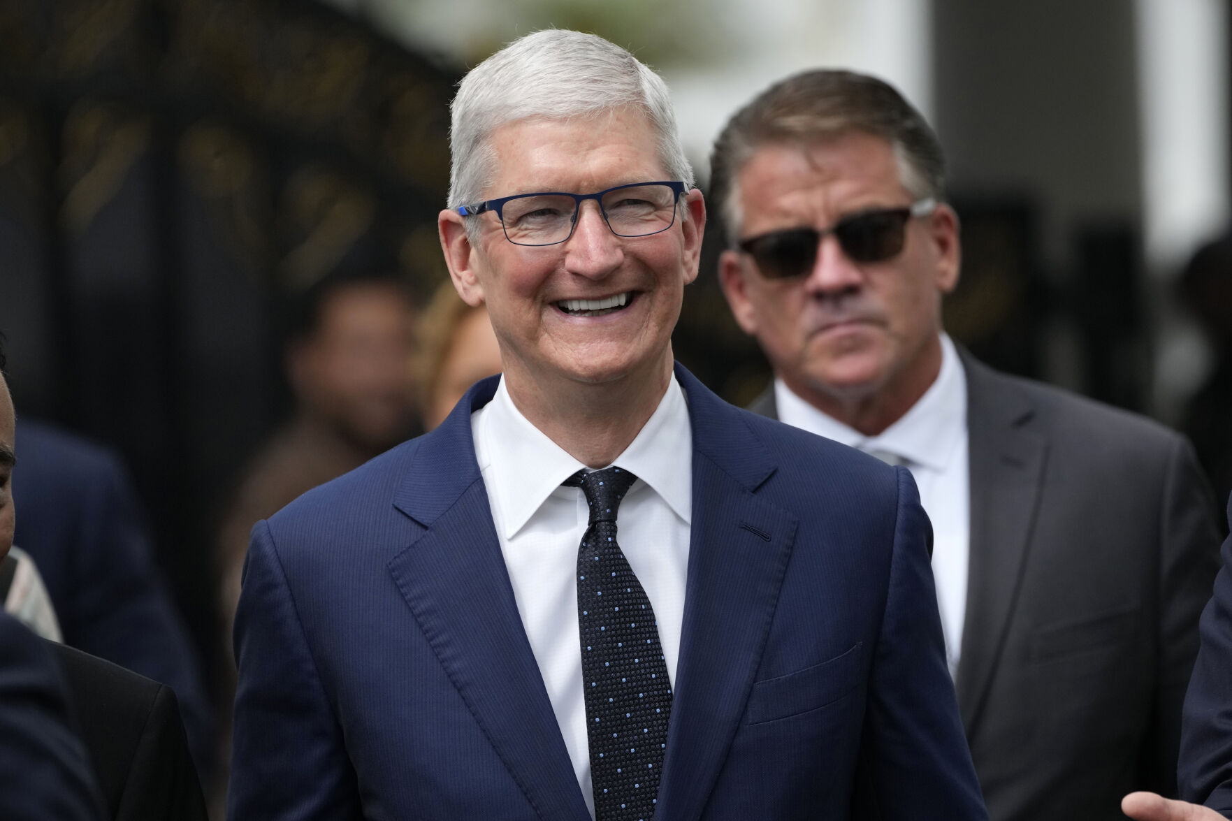 FILE - Apple CEO Tim Cook walks after a meeting with Indonesian President Joko Widodo in Jakarta, Indonesia, April 17, 2024. Cook was among the highest paid CEO