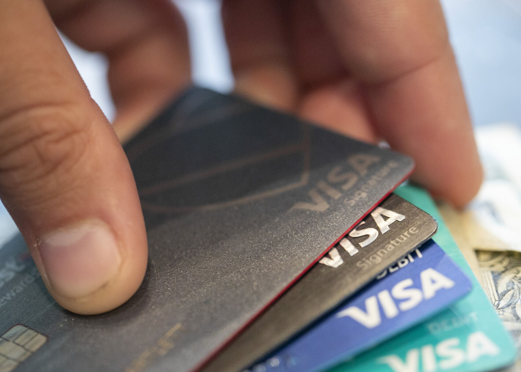 <p>FILE - Visa credit cards in New Orleans, Aug. 11, 2019. Consumers are increasingly struggling to pay their credit card bills, raising concerns about severe delinquencies spiraling and sapping consumer spending. (AP Photo/Jenny Kane, File)</p>   PHOTO CREDIT: Jenny Kane 