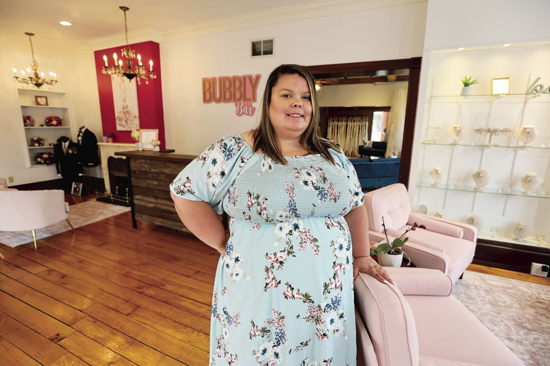 Shelby Duggan is the owner of Vintage Chic Bridal Boutique in Dubuque on Friday, June 7, 2024.    PHOTO CREDIT: Dave Kettering