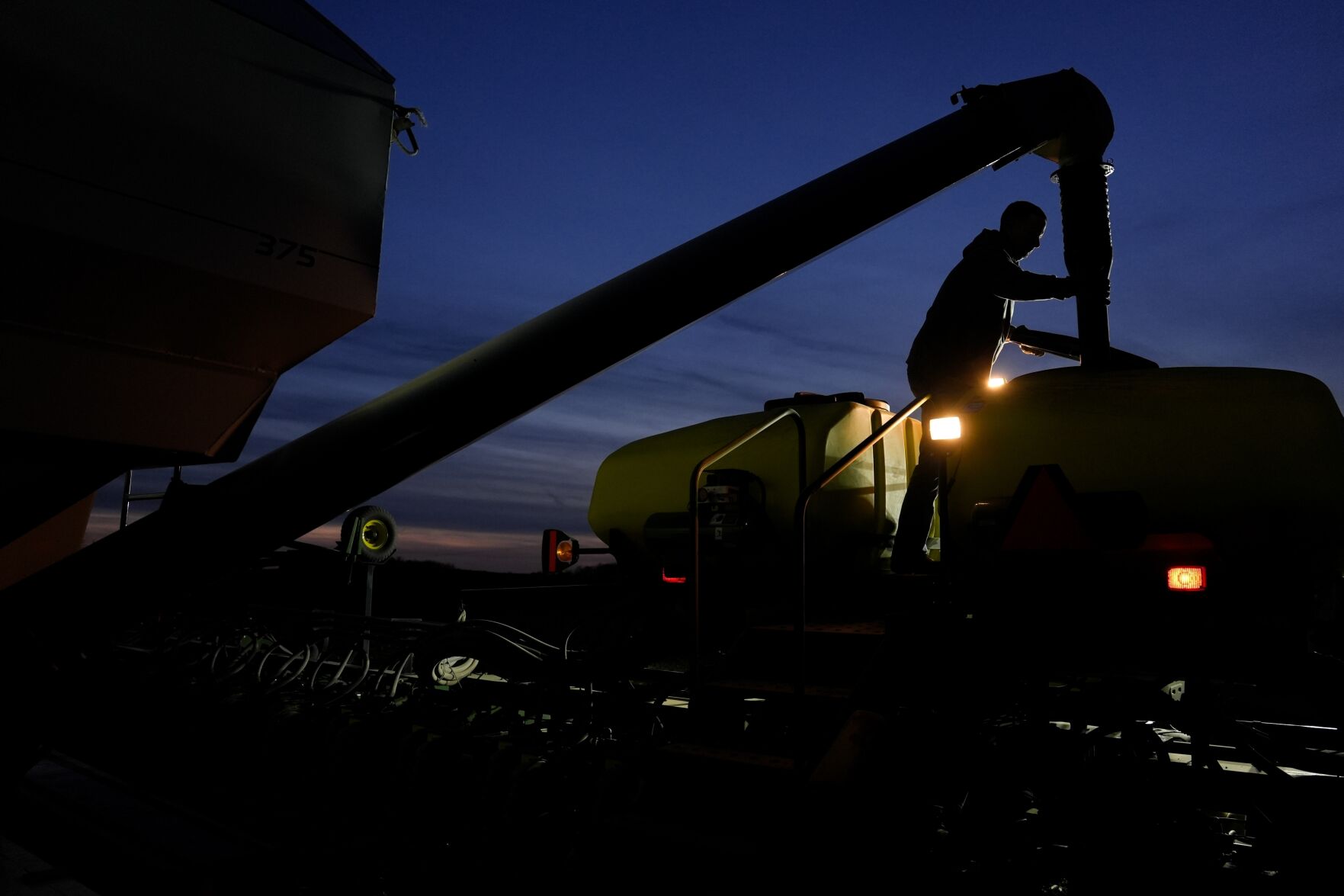 <p>FILE - Mark Woodruff loads soybean seeds into a planter on April 22, 2024, in Sabina, Ohio. On Thursday, June 13, 2024, The labor department releases producer prices data for May. (AP Photo/Joshua A. Bickel, File)</p>   PHOTO CREDIT: Joshua A. Bickel 