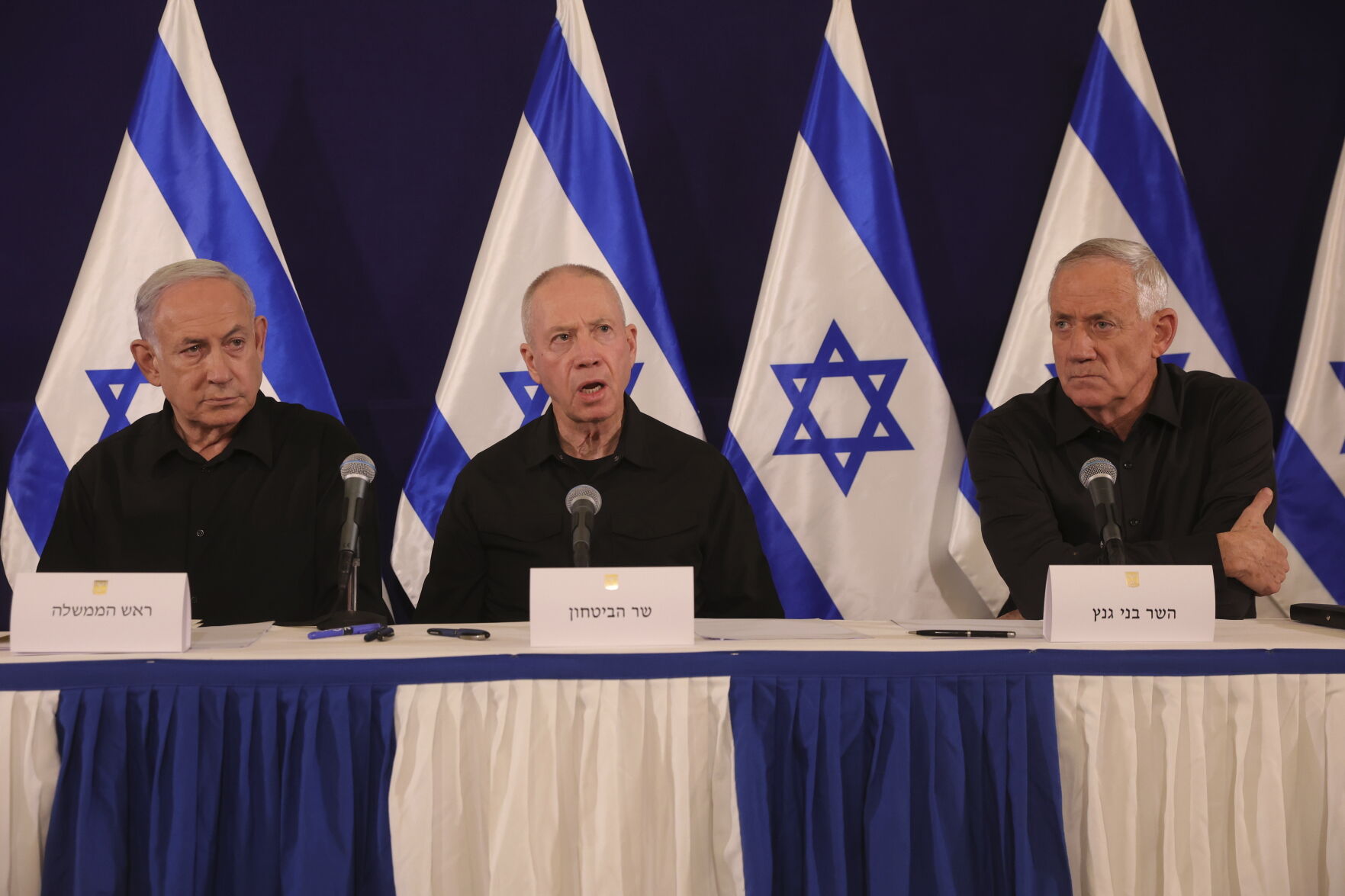 <p>FILE - From left, Israeli Prime Minister Benjamin Netanyahu, Defense Minister Yoav Gallant and Cabinet Minister Benny Gantz speak during a news conference in the Kirya military base in Tel Aviv, Israel on Oct. 28, 2023. Israeli officials said Monday, June 17, 2024, that Netanyahu has dissolved the influential War Cabinet that was tasked with steering the war in Gaza. (Abir Sultan/Pool Photo via AP, File)</p>   PHOTO CREDIT: Abir Sultan