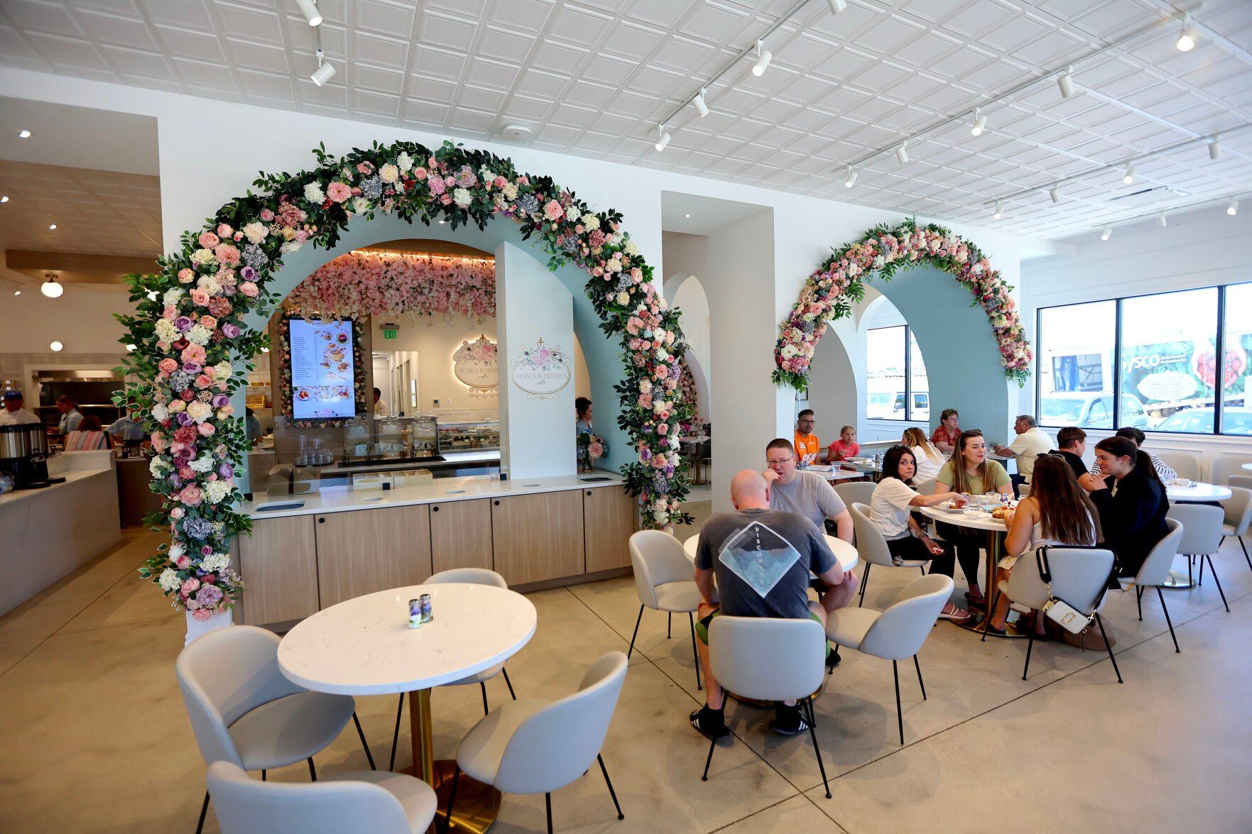 People eat lunch at Roses & Berries Cafe in Dubuque last week.    PHOTO CREDIT: Dave Kettering