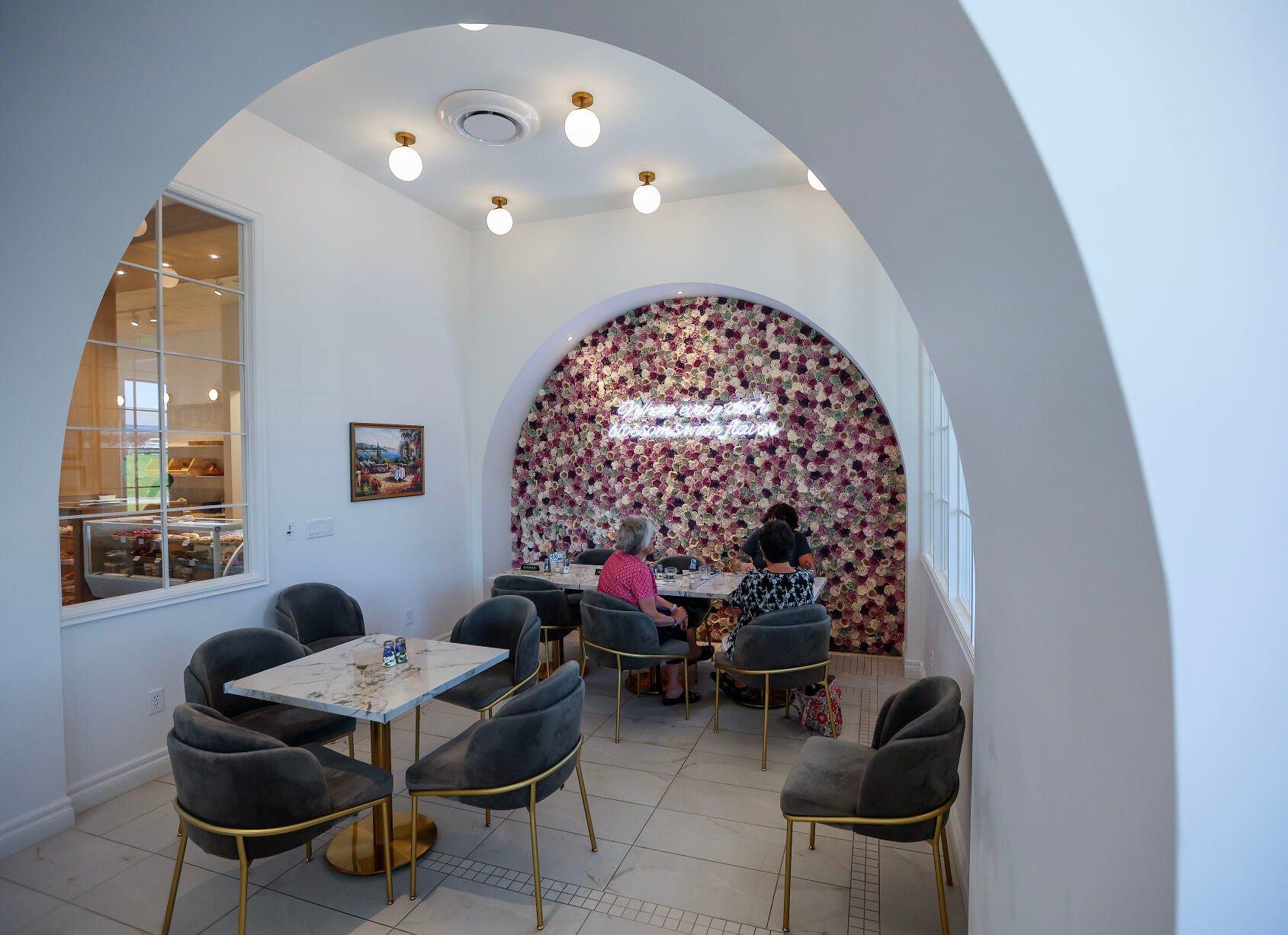 People enjoy their lunch inside Roses & Berries Cafe in Dubuque on Friday, June 14, 2024.    PHOTO CREDIT: Dave Kettering