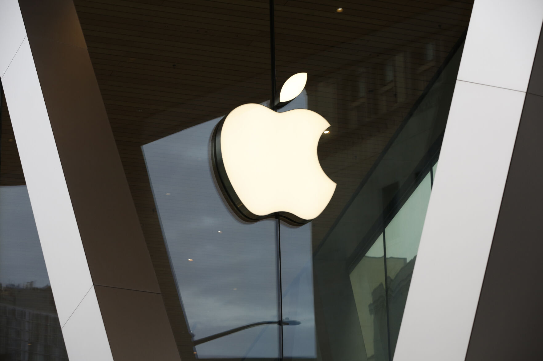 <p>FILE - An Apple logo adorns the facade of the downtown Brooklyn Apple store on March 14, 2020, in New York. Apple is discontinuing its buy now, pay later service known as Apple Pay Later, barely a year of it being broadly available in the U.S., and instead plans to rely on the larger companies who already dominate the industry like Affirm and Klarna. (AP Photo/Kathy Willens, File)</p>   PHOTO CREDIT: Kathy Willens