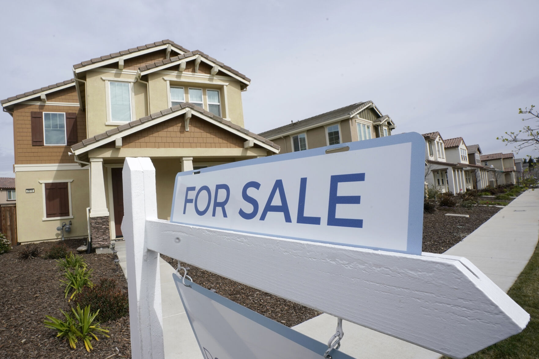 <p>FILE - A for sale sign is posted in front of a home in Sacramento, Calif., March 3, 2022. The Biden administration is announcing new federal initiatives to increase access to affordable housing as high interest rates and still-high prices on groceries and other necessities have dramatically pushed up the cost of living in the post-pandemic years. Treasury Secretary Janet Yellen is traveling to Minneapolis on Monday, June 24, 2024, to promote the new investments. (AP Photo/Rich Pedroncelli, File)</p>   PHOTO CREDIT: Rich Pedroncelli 