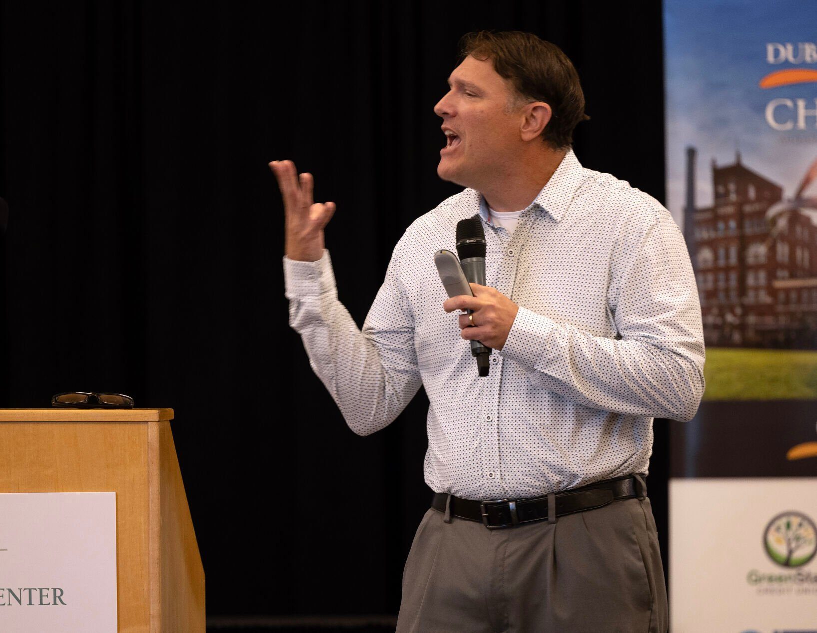 Keynote speaker Neil Ihde presents during the Dubuque Area Chamber of Commerce’s annual meeting at Grand River Center in Dubuque on Wednesday.    PHOTO CREDIT: Gassman