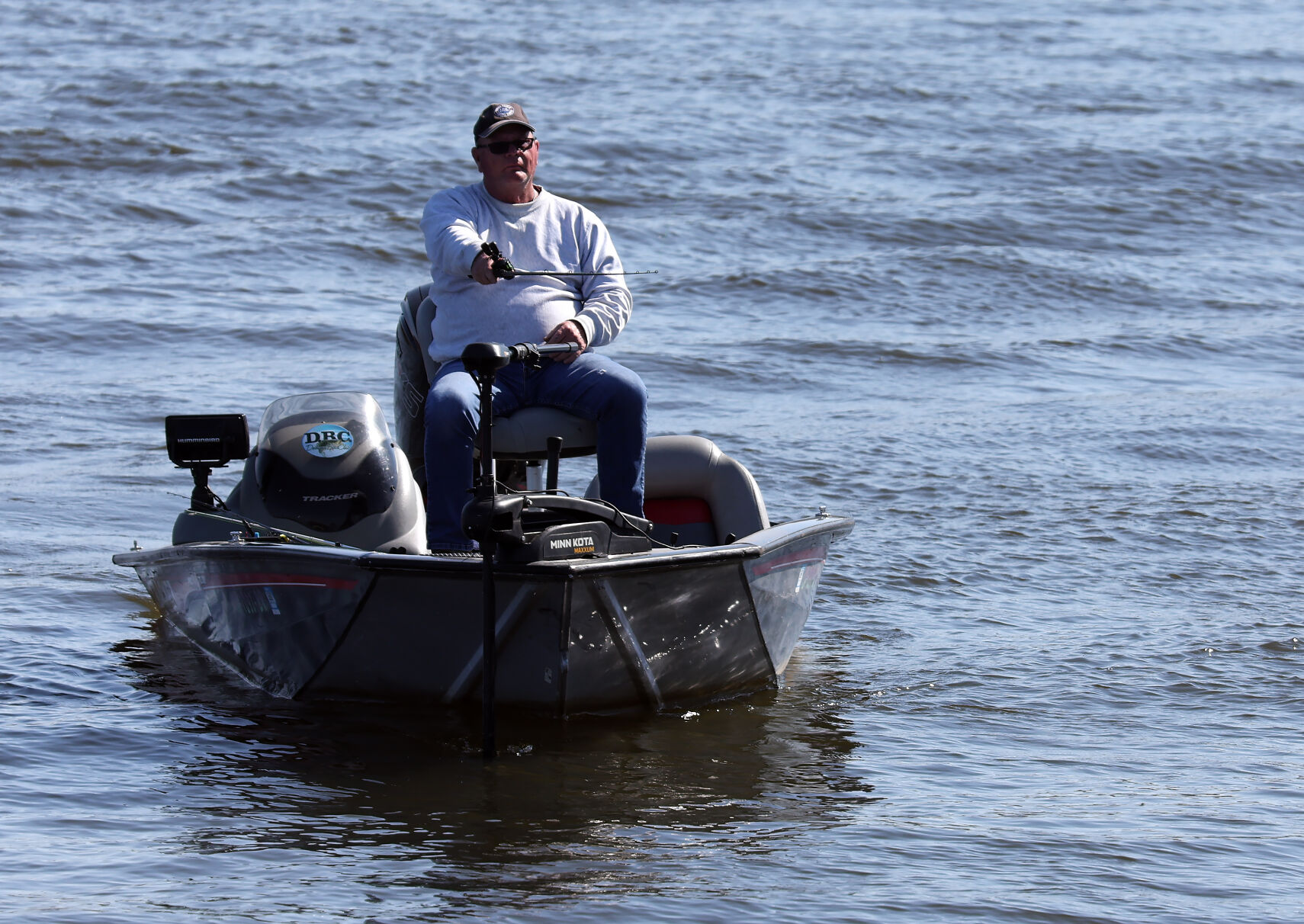 An angler fishes on the Mississippi River near A.Y. McDonald Park in Dubuque.    PHOTO CREDIT: Stephen Gassman
Telegraph Herald