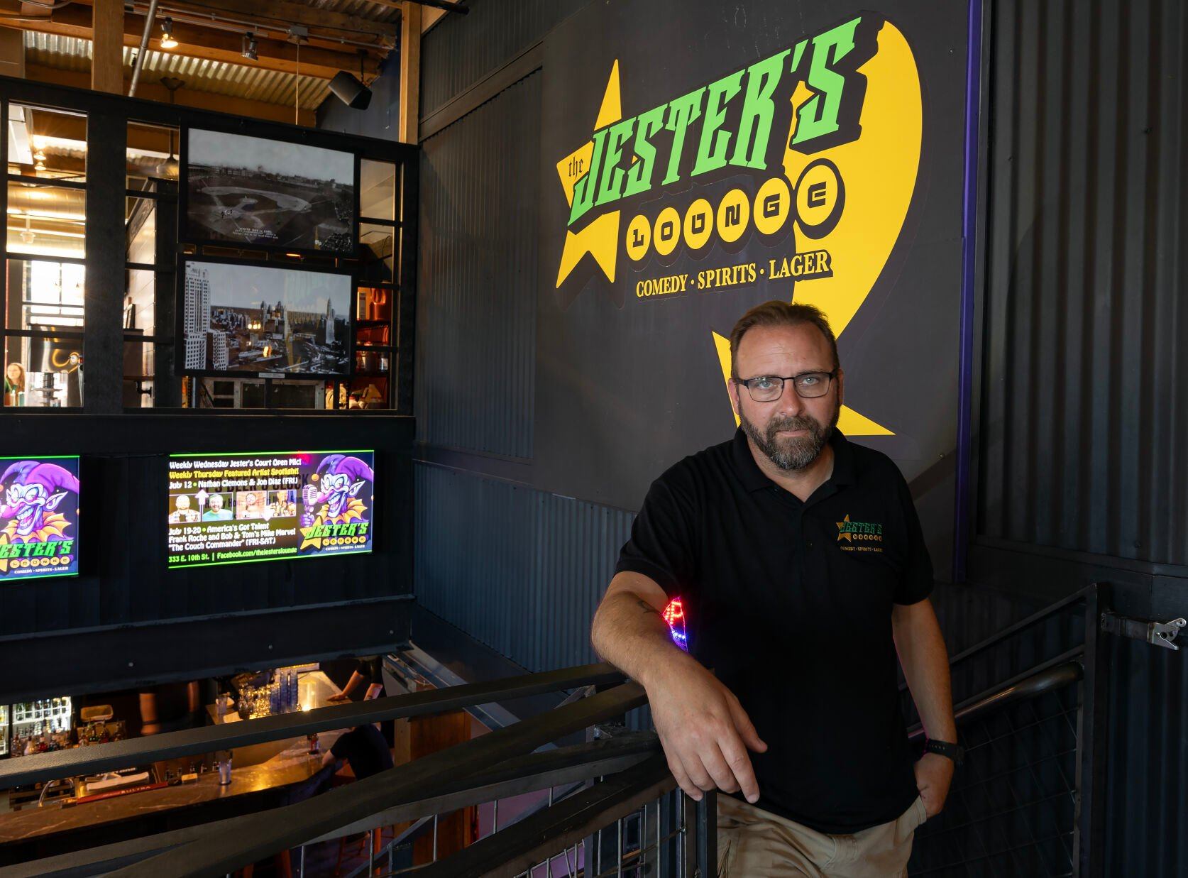 Owner John Ohnesorge stands at The Jester’s Lounge in Dubuque on Friday.    PHOTO CREDIT: Stephen Gassman