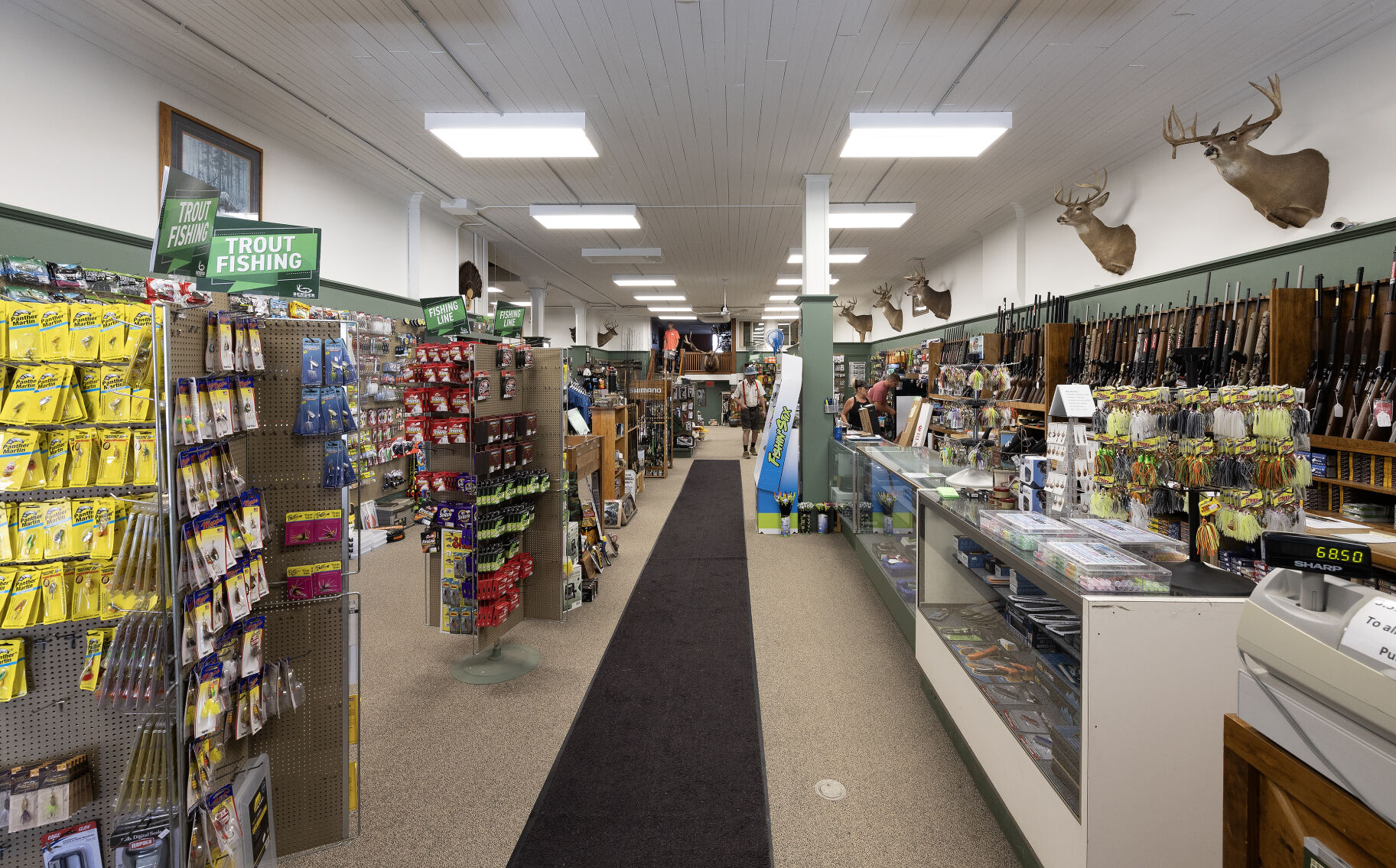 The exterior (top) and interior of Bender Outdoors in Lancaster, Wis.    PHOTO CREDIT: Stephen Gassman