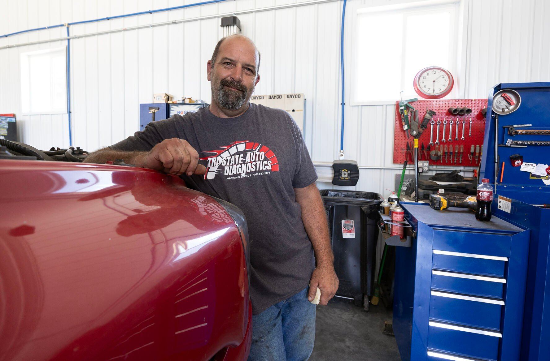 Owner Rick Soppe stands in the shop at Tri-State Auto Diagnostics in Graf, Iowa.    PHOTO CREDIT: Stephen Gassman