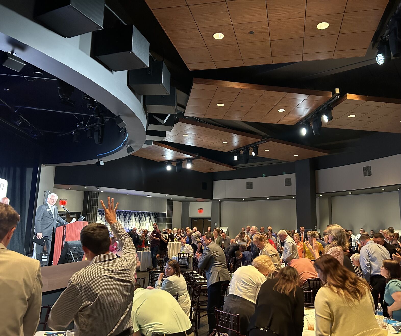 Rick Dickinson reacts to an attendee yelling “Four more years” after he announced plans to step down by the end of 2025, during the organization’s annual meeting at Q Casino + Resort on Wednesday. He has held the role since 1995. 