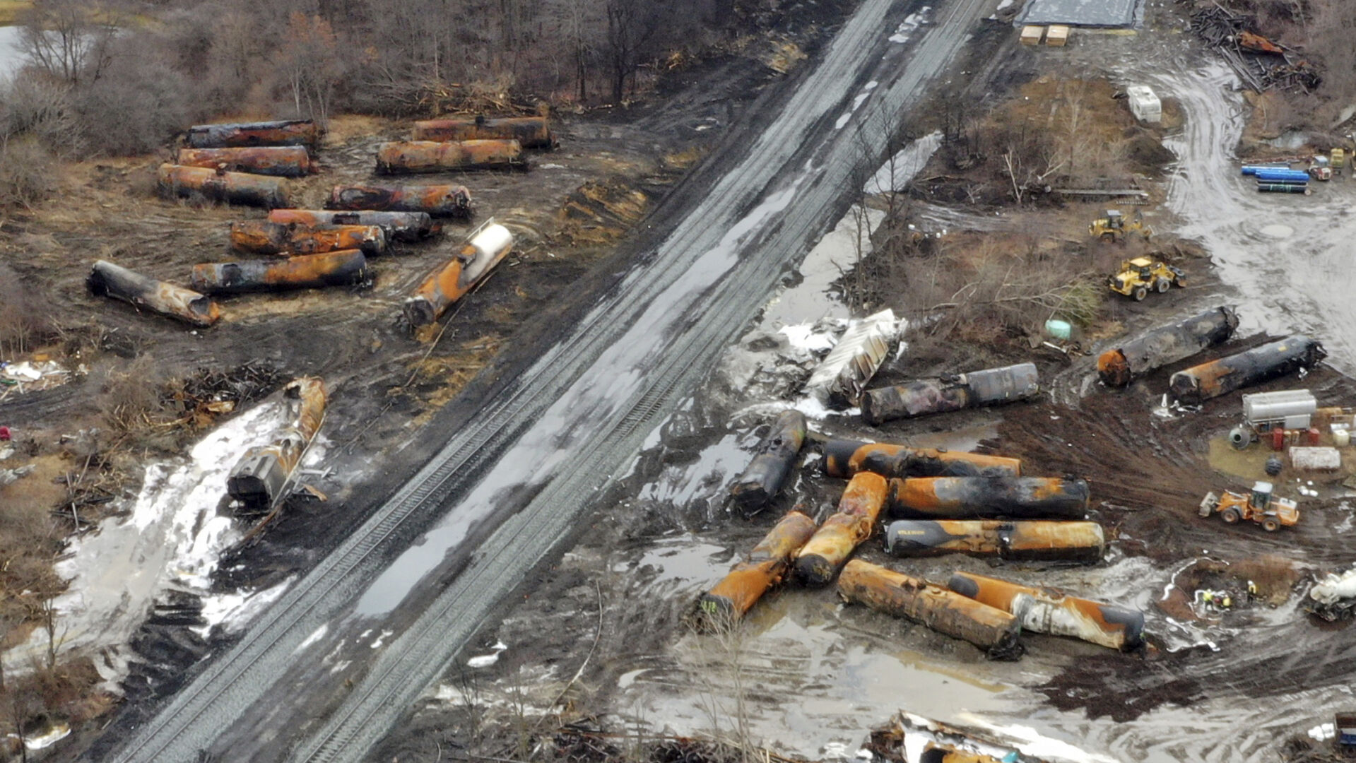 FILE - This image taken with a drone shows the continuing cleanup of portions of a Norfolk Southern freight train on Feb. 9, 2023, that derailed in East Palestine, Ohio. Amit Bose, the head of the Federal Railroad Administration, plans to testify at a House hearing Tuesday, July 23, 2024, that railroad safety has stagnated over the last decade and more needs to be done. But it