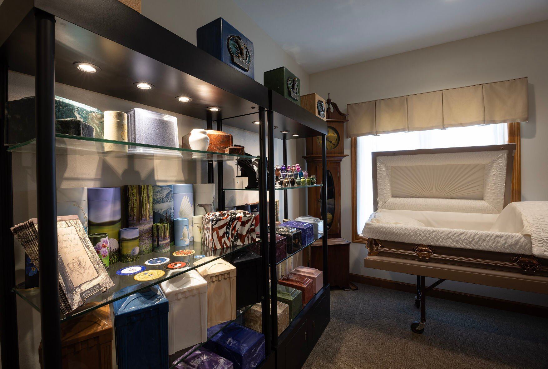 The urn and casket display room at Haudenshield Funeral Home & Crematory in Cuba City, Wis.    PHOTO CREDIT: Gassman