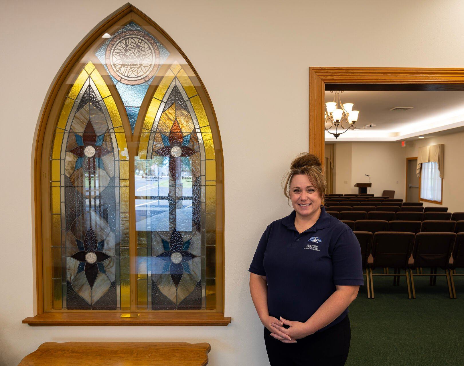 Director Jillian Krueger stands inside Haudenshield Funeral Home & Crematory in Cuba City, Wis.    PHOTO CREDIT: Stephen Gassman