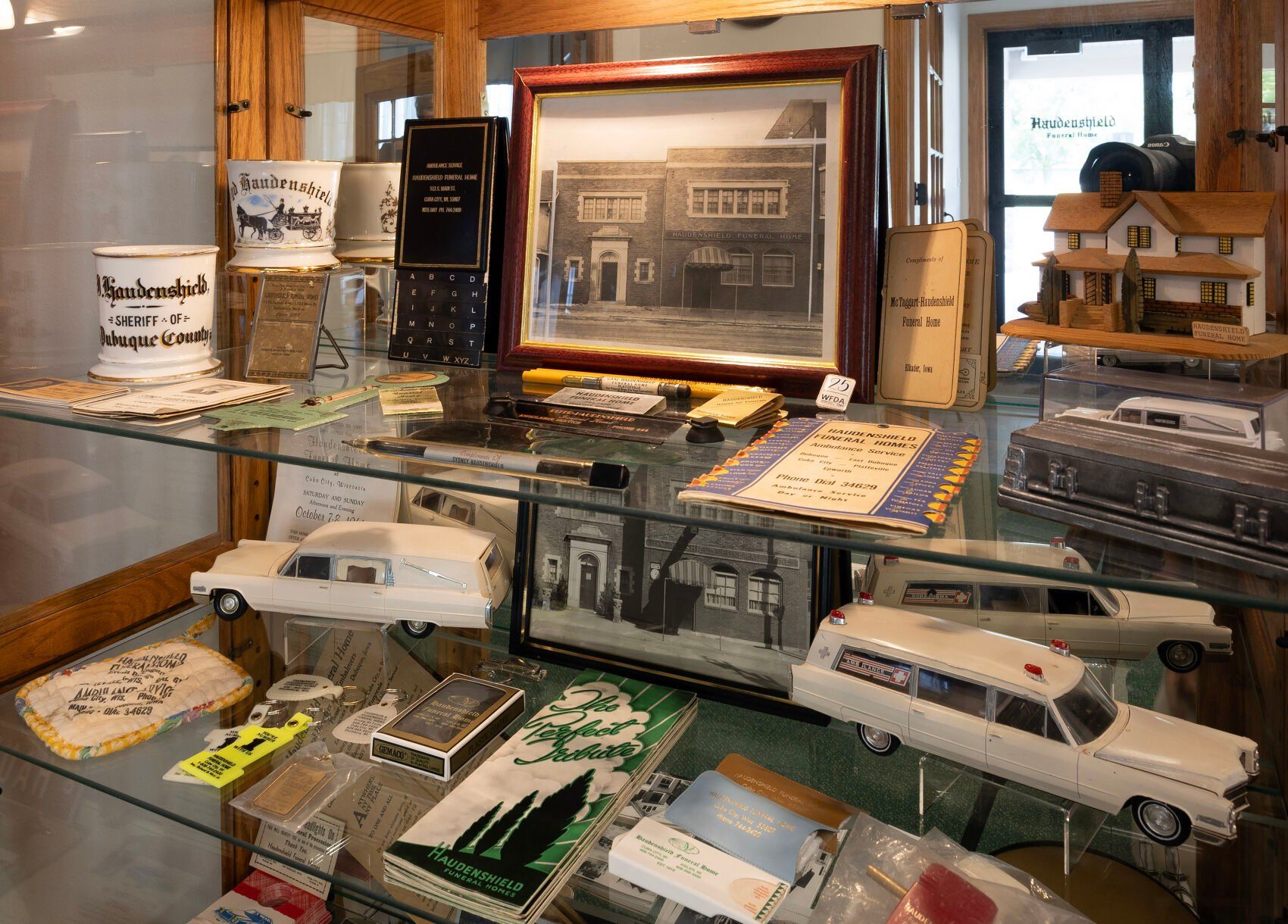 A display of memorabilia at Haudenshield Funeral Home & Crematory in Cuba City, Wis., on Friday, July 26, 2024.    PHOTO CREDIT: Gassman