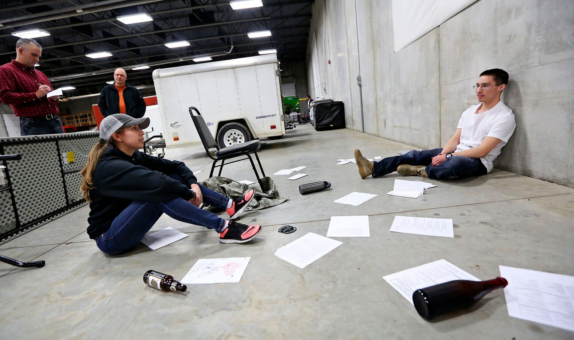 Nicole Salazar (left), with the Dubuque Police Department, participates in crisis intervention training at the Dubuque County Emergency Responder Training Facility in Dubuque.    PHOTO CREDIT: File photo