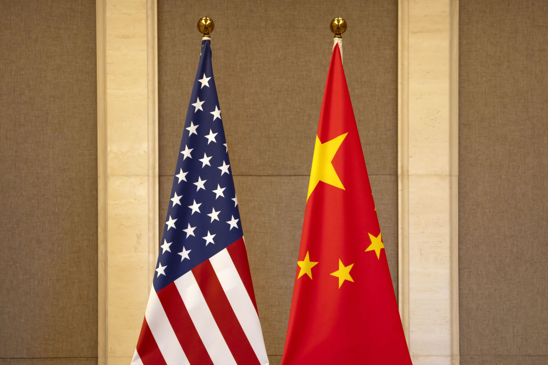 <p>FILE - U.S. and Chinese flags are set up at the Diaoyutai State Guesthouse in Beijing, on July 8, 2023. Lured by the large U.S. market, Chinese businesses are coming to the U.S. with money, jobs and technology, only to find rising suspicion at a time of an intensifying U.S.-China rivalry that has spread into the business world. (AP Photo/Mark Schiefelbein, Pool, File)</p>   PHOTO CREDIT: Mark Schiefelbein 