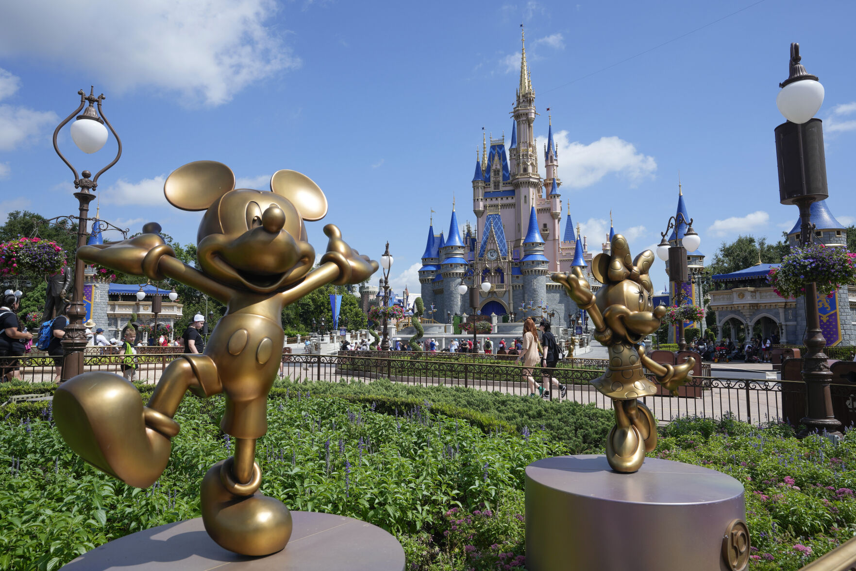 <p>FILE - The Cinderella Castle is seen at the Magic Kingdom at Walt Disney World, July 14, 2023, in Lake Buena Vista, Fla. (AP Photo/John Raoux, File)</p>   PHOTO CREDIT: John Raoux 