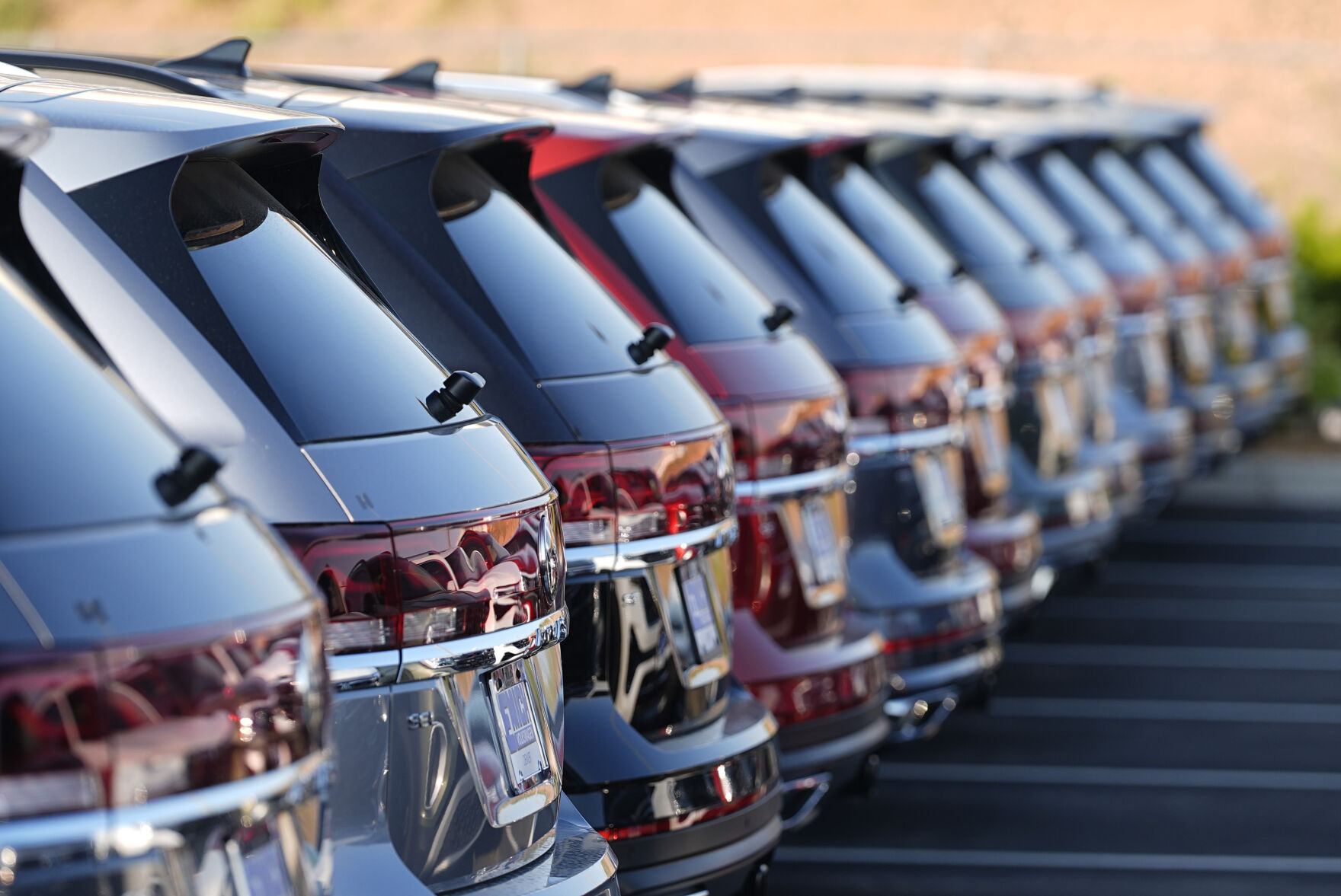 <p>A long row of unsold 2024 Atlas utility vehicles is shown Sunday, July 28, 2024, at a Volkswagen dealership in Denver. (AP Photo/David Zalubowski)</p>   PHOTO CREDIT: David Zalubowski 