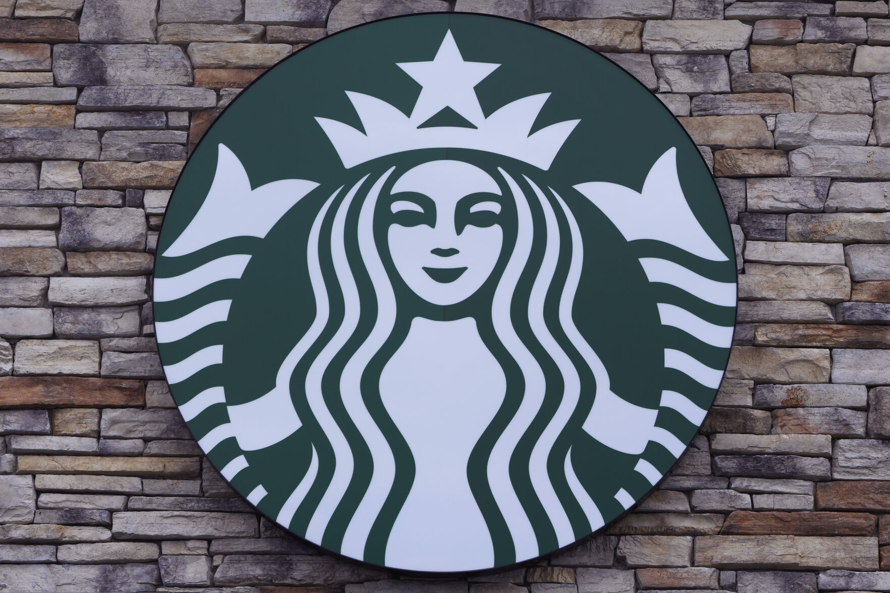 <p>FILE - A Starbucks mermaid logo sign is displayed on a store, May 29, 2024, in Salem, N.H. (AP Photo/Charles Krupa, File)</p>   PHOTO CREDIT: Charles Krupa 