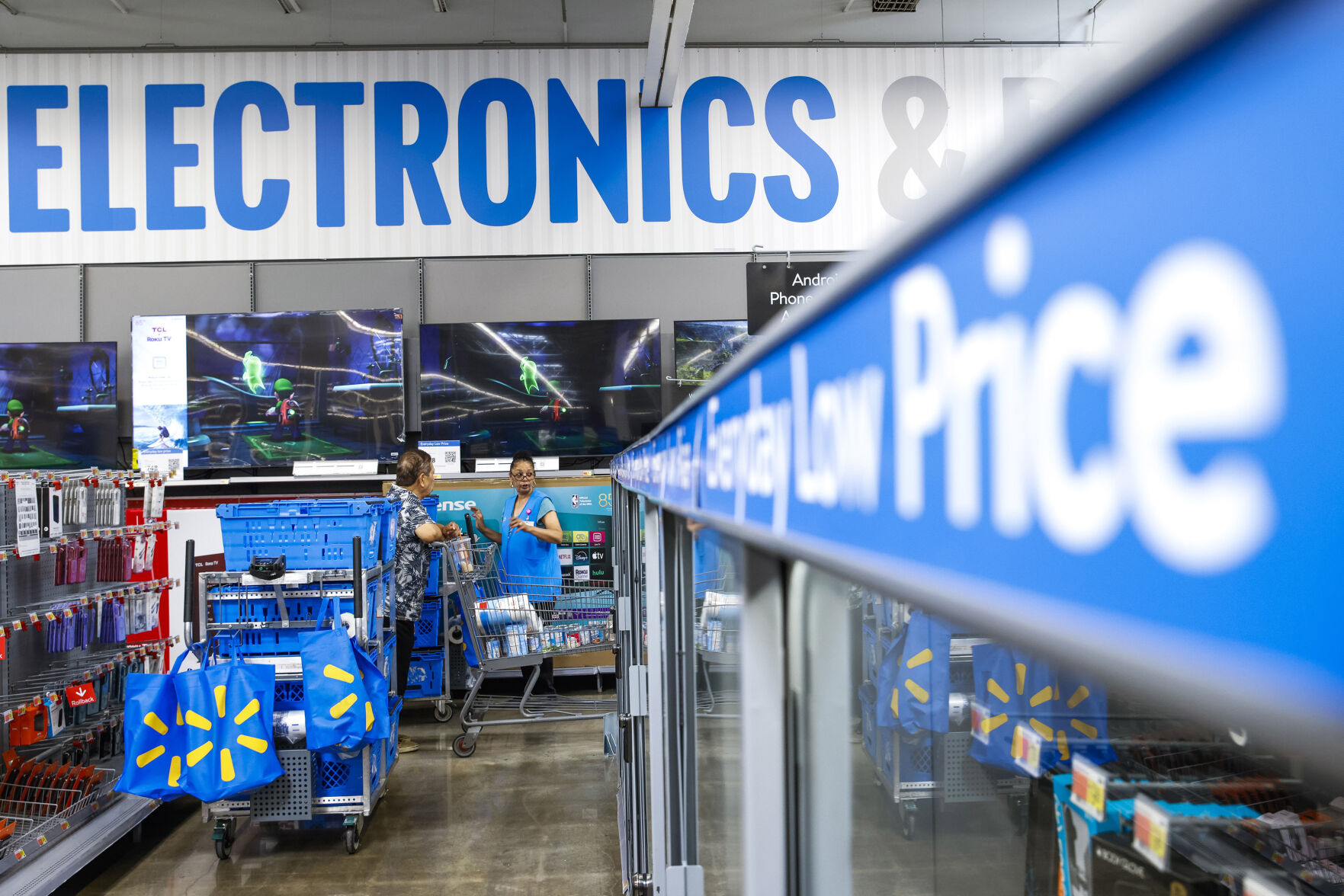 <p>FILE - People walk around a Walmart Superstore in Secaucus, New Jersey, on July 11, 2024. (AP Photo/Eduardo Munoz Alvarez, File)</p>   PHOTO CREDIT: Eduardo Munoz Alvarez