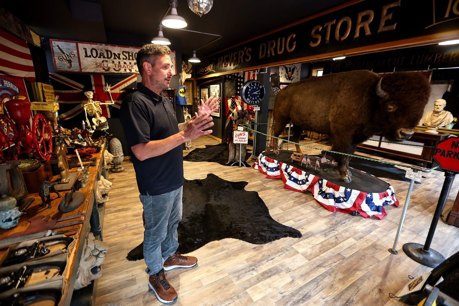 Clifford Blanck, co-owner of White Rooster Antiques, shows his showroom full of collectibles in Galena, Ill.    PHOTO CREDIT: Dave Kettering