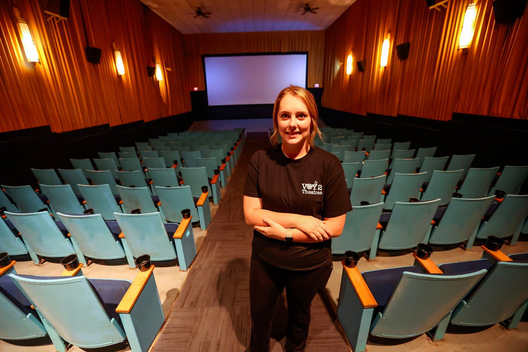 Former employee Taylor Casel, of Maquoketa, Iowa, is the new owner of Voy 2 Theatres.    PHOTO CREDIT: Dave Kettering