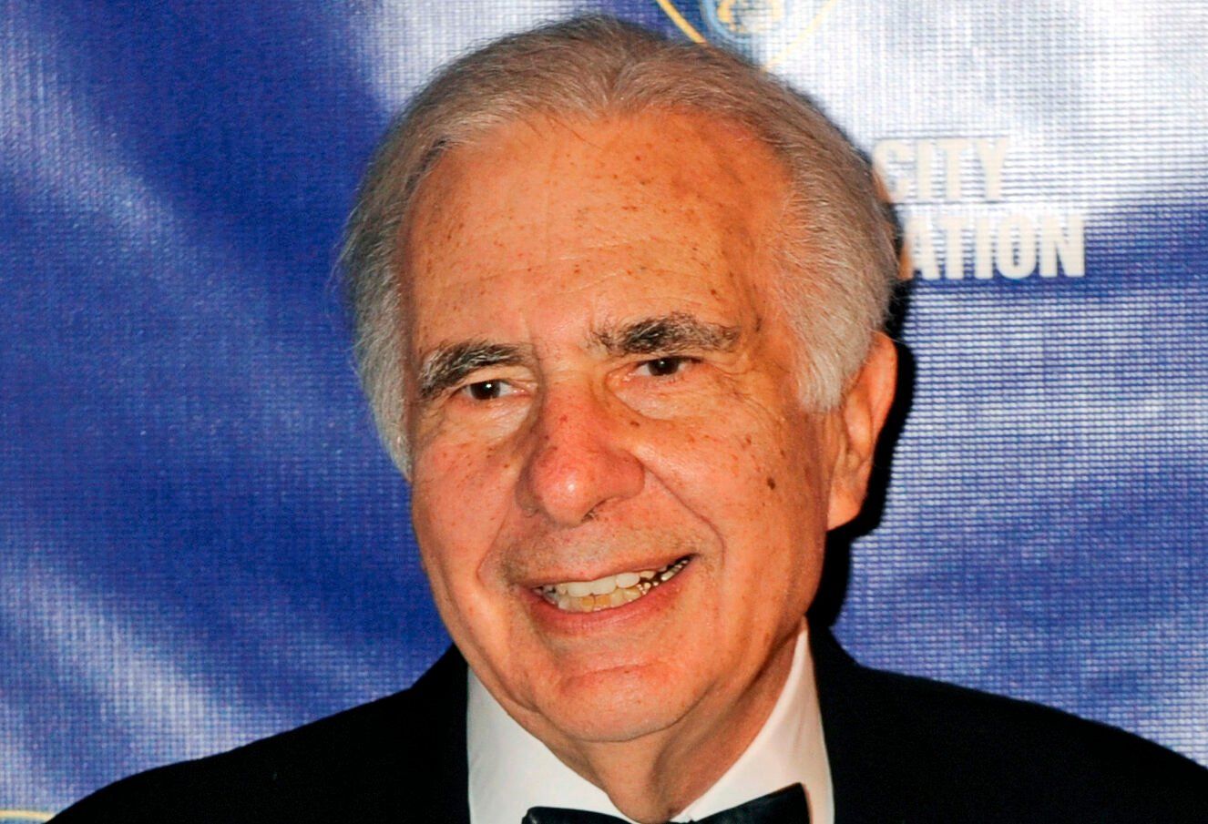 <p>FILE - Financier Carl Icahn poses for photos upon arriving for the annual New York City Police Foundation Gala in New York, March 16, 2010. (AP Photo/Henny Ray Abrams, File)</p>   PHOTO CREDIT: Henny Ray Abrams 