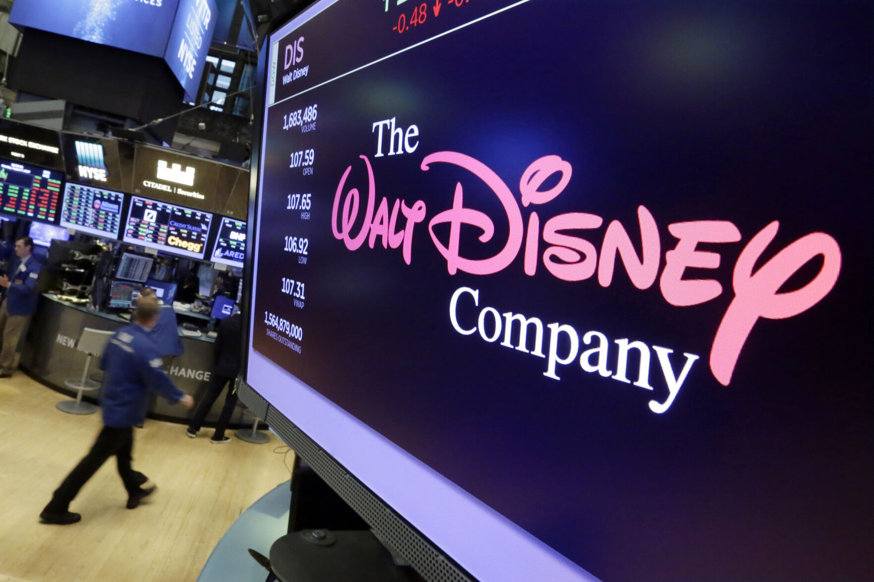 <p>FILE - In this Aug. 8, 2017, file photo, The Walt Disney Co. logo appears on a screen above the floor of the New York Stock Exchange. (AP Photo/Richard Drew, File)</p>   PHOTO CREDIT: Richard Drew