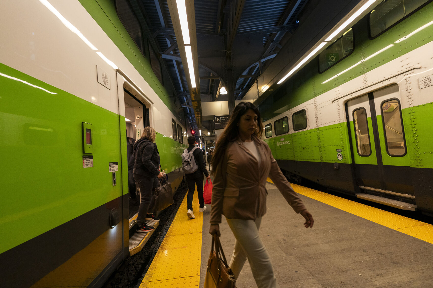 Commuters arrive at Union Station on a GO Train as a national rail shutdown causes delays in Toronto, Thursday, Aug. 22, 2024. (Paige Taylor White /The Canadian Press via AP)    PHOTO CREDIT: Associated Press