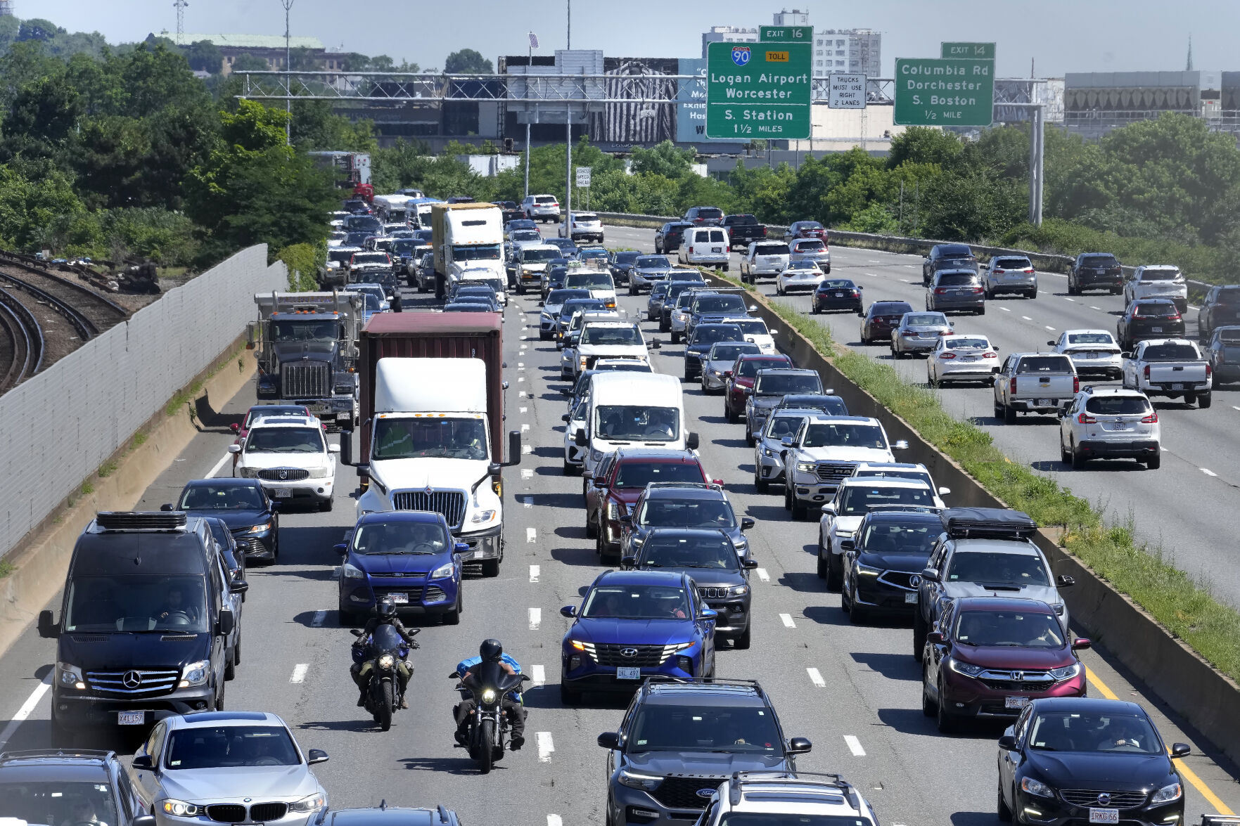 <p>FILE - Vehicles move slowly in south-bound lanes, left, of Interstate Route 93, in Boston, on July 3, 2024. (AP Photo/Steven Senne, File)</p>   PHOTO CREDIT: Steven Senne