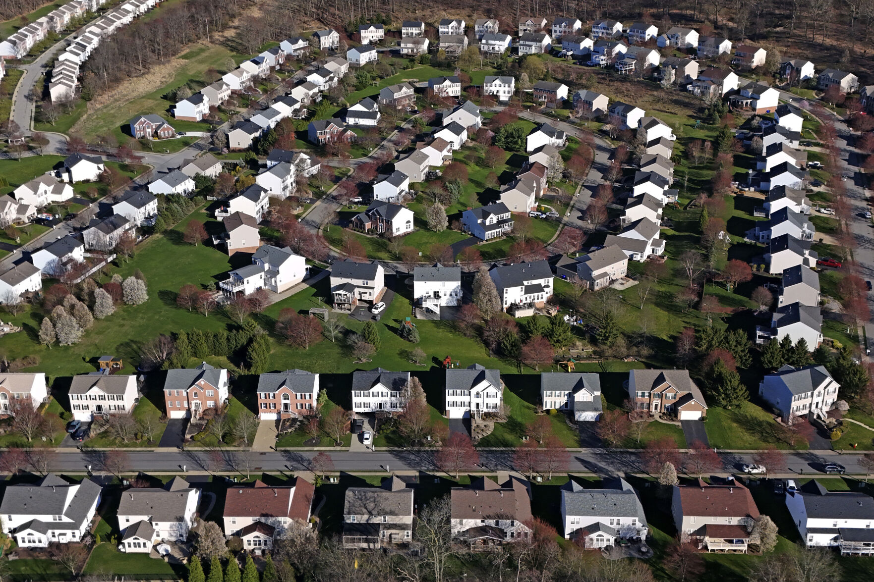 <p>FILE - A housing development in Cranberry Township, Pa., is shown on March 29, 2024. (AP Photo/Gene J. Puskar)</p>   PHOTO CREDIT: Gene J. Puskar 