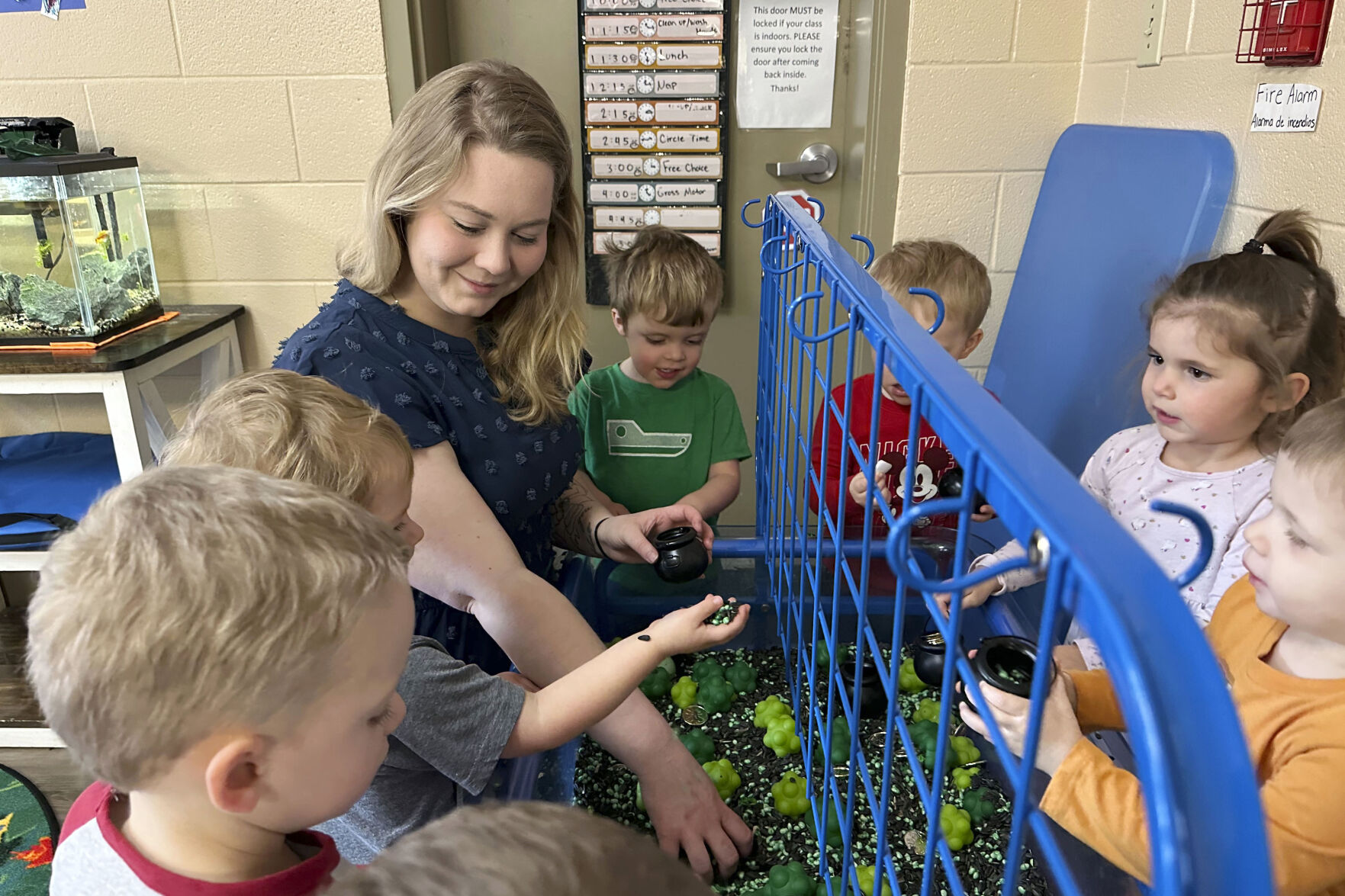 <p>FILE - Rylee Monn plays with children in her class at a child care center in Lexington, Ky., March 13, 2024. (AP Photo/Dylan Lovan, File)</p>   PHOTO CREDIT: Dylan Lovan 