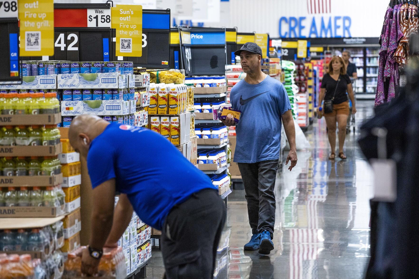 <p>FILE - People shop at a Walmart Superstore in Secaucus, New Jersey, July 11, 2024. (AP Photo/Eduardo Munoz Alvarez, File)</p>   PHOTO CREDIT: Eduardo Munoz Alvarez - freelancer, ASSOCIATED PRESS