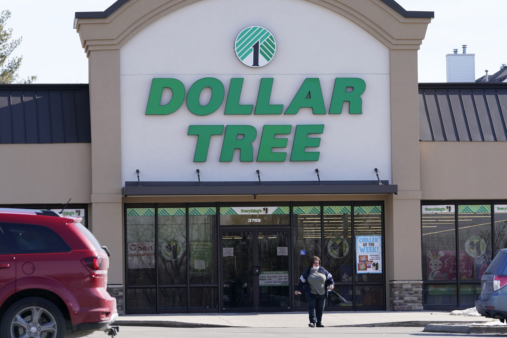 <p>FILE - A woman leaves a Dollar Tree store in Urbandale, Iowa, on Feb. 25, 2021. Dollar Tree is slashing its full-year adjusted earnings and sales forecasts as its customers are taking an even more cautious approach to their spending and buying less. (AP Photo/Charlie Neibergall)</p>   PHOTO CREDIT: Charlie Neibergall 