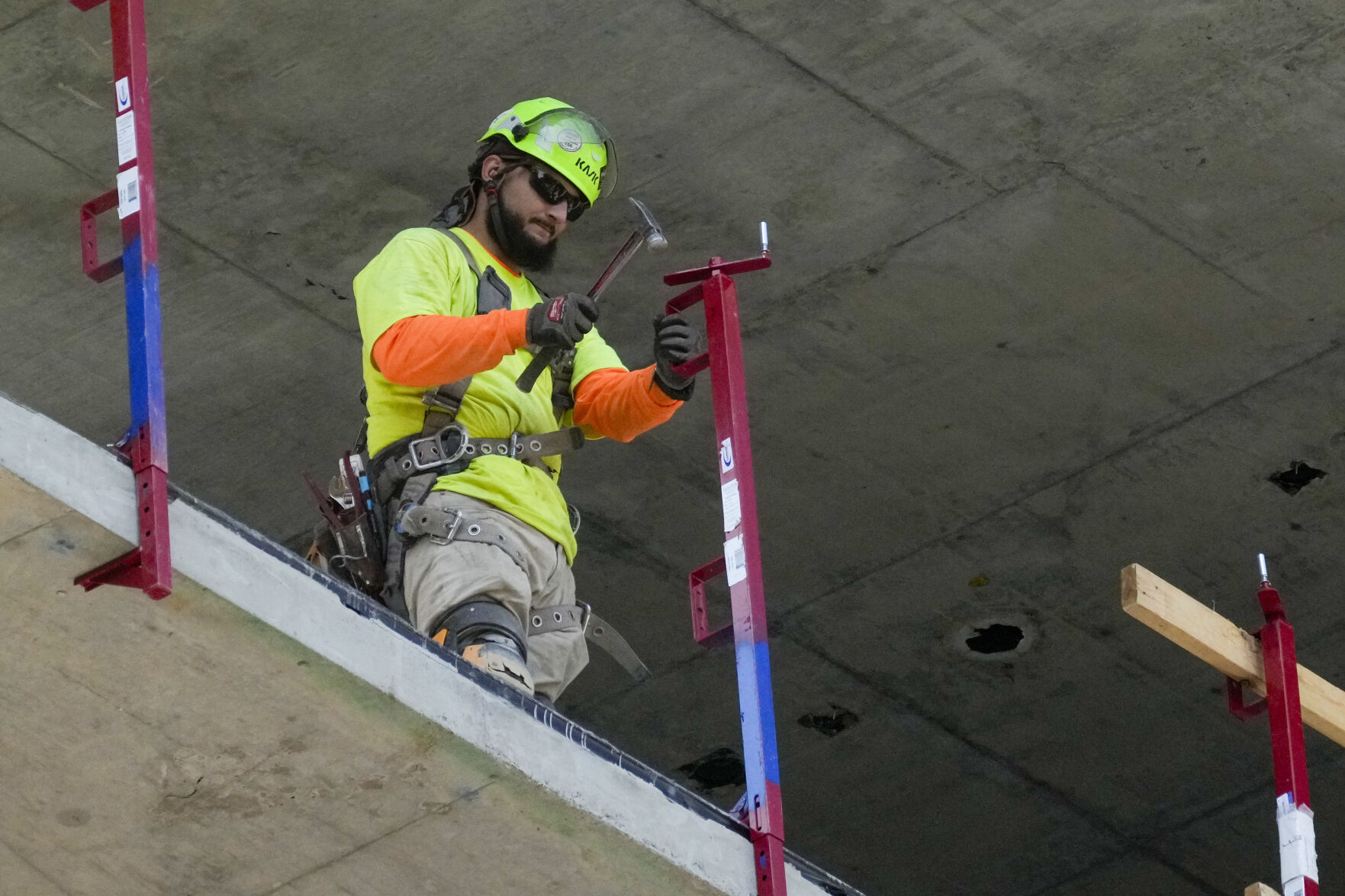 <p>A construction worker installs a safety railing on a new building in Philadelphia, Tuesday, Sept. 3, 2024. (AP Photo/Matt Rourke)</p>   PHOTO CREDIT: Matt Rourke 