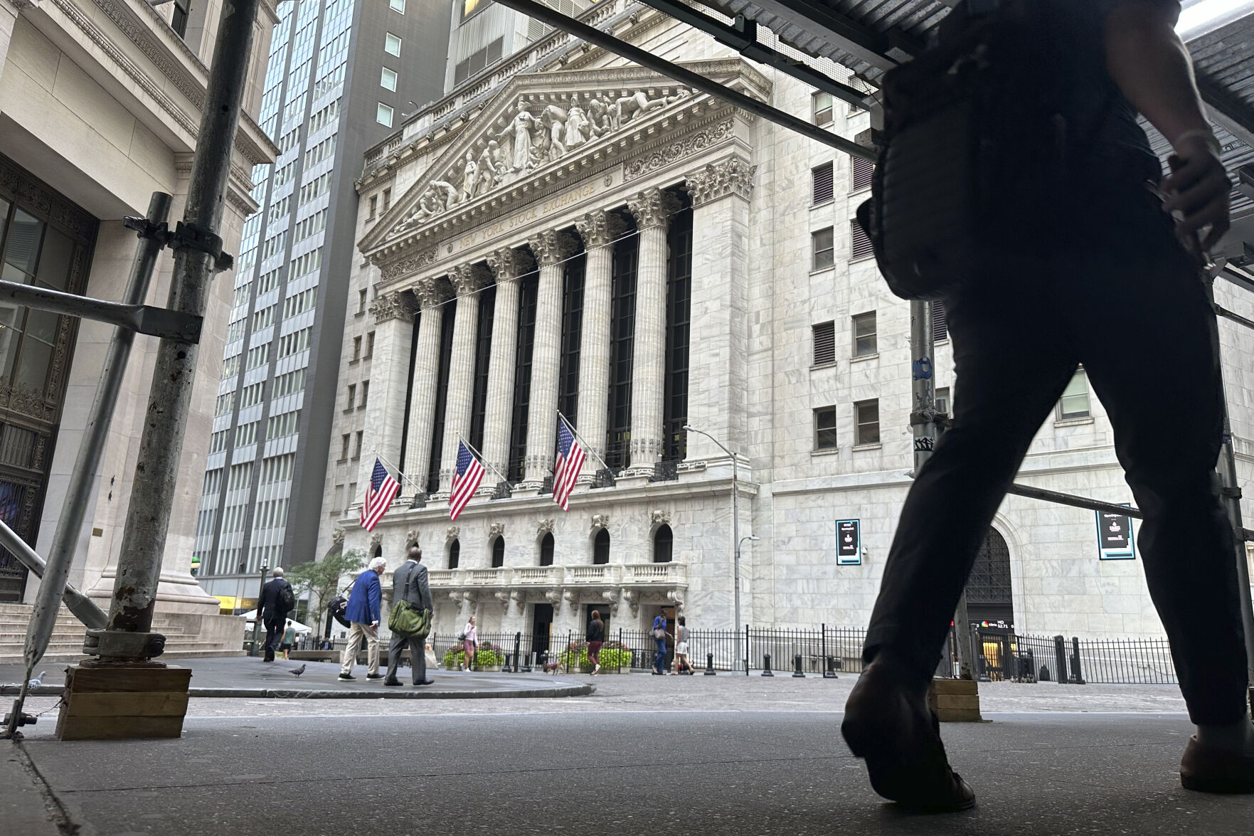 <p>FILE - People pass the New York Stock Exchange on Aug. 27, 2024, in New York. (AP Photo/Peter Morgan, File)</p>   PHOTO CREDIT: Peter Morgan - staff, ASSOCIATED PRESS