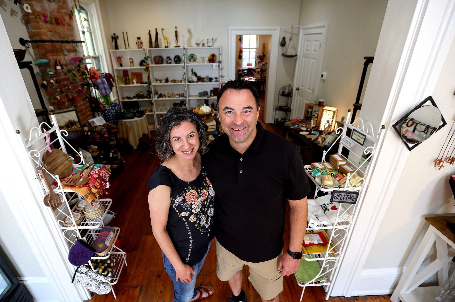 Jen and Brad Cavanagh are the new owners of A Ripple Effect, a fair trade shop located in Dubuque’s Cable Car Square. This weekend will mark the store’s official grand opening with its new owners.    PHOTO CREDIT: Dave Kettering