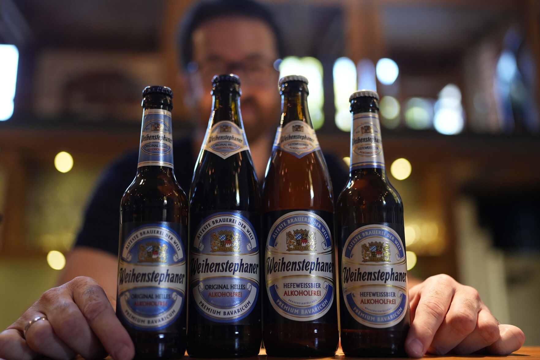 <p>Head Brewmaster Tobias Zollo poses behind non alcoholic beer at the Weihenstephan brewery in Freising, Germany, Friday, Sept. 20, 2024. (AP Photo/Matthias Schrader)</p>   PHOTO CREDIT: Matthias Schrader