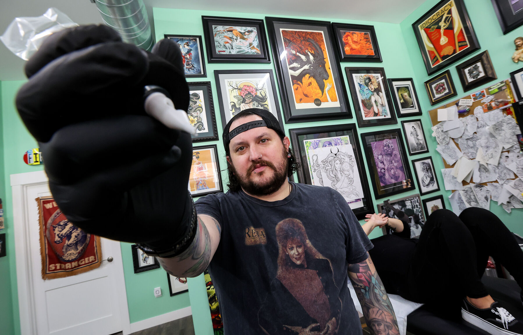 Alec Bauer owns First Light Tattoo & Gallery in Dubuque.    PHOTO CREDIT: Dave Kettering
Telegraph Herald