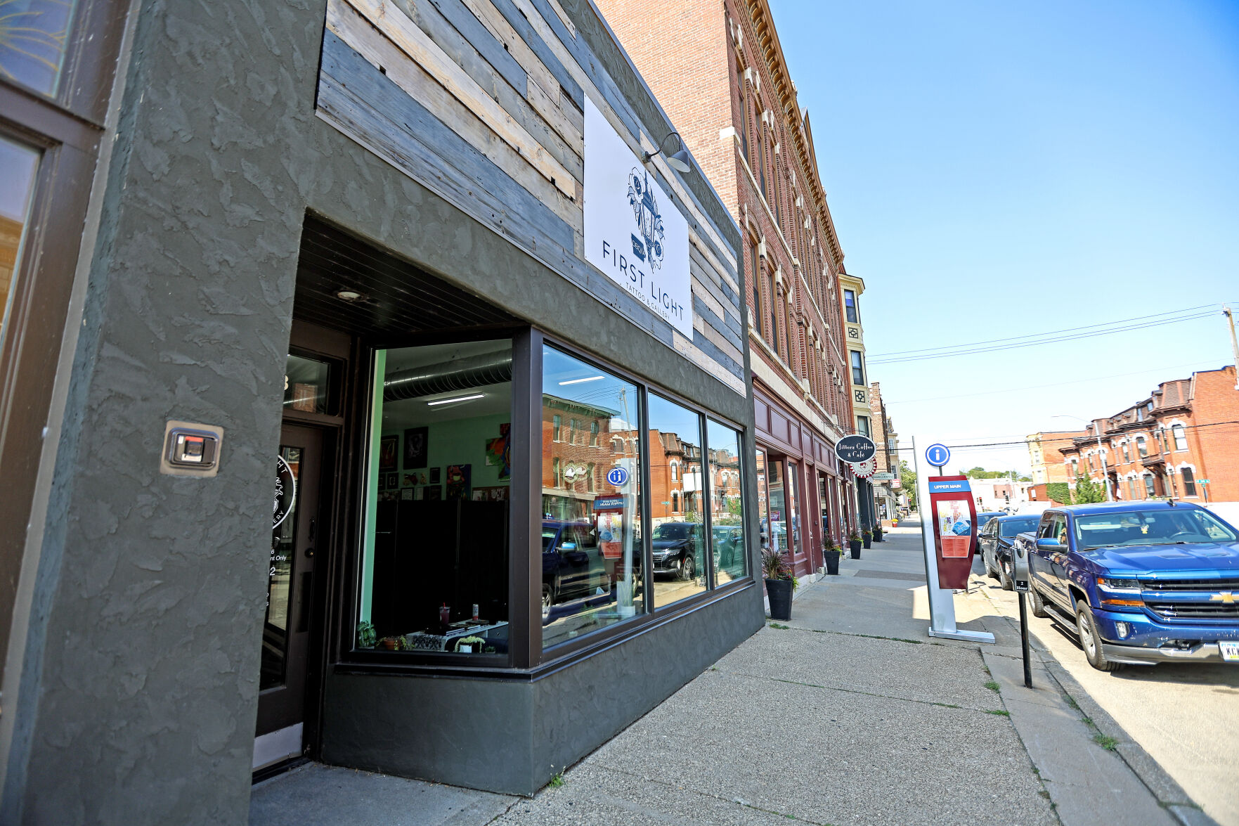 First Light Tattoo & Gallery is located at 1053 Main St. in Dubuque. The business opened in 2019. Bauer said he can do any style, but his specialty is neo-traditional — which uses bold colors and generally portrays floral themes, wildlife or portraits of women.    PHOTO CREDIT: Dave Kettering
Telegraph Herald