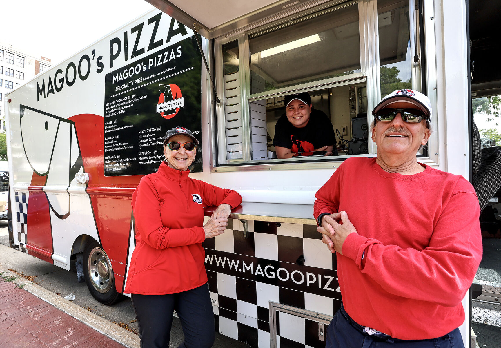 Susan Farber (left) and husband Bernie Saks are the owners of Magoo Mobile truck, and Molly Richardson is the general manager of the business, which also has a brick-and-mortar location.    PHOTO CREDIT: Dave Kettering Telegraph Herald